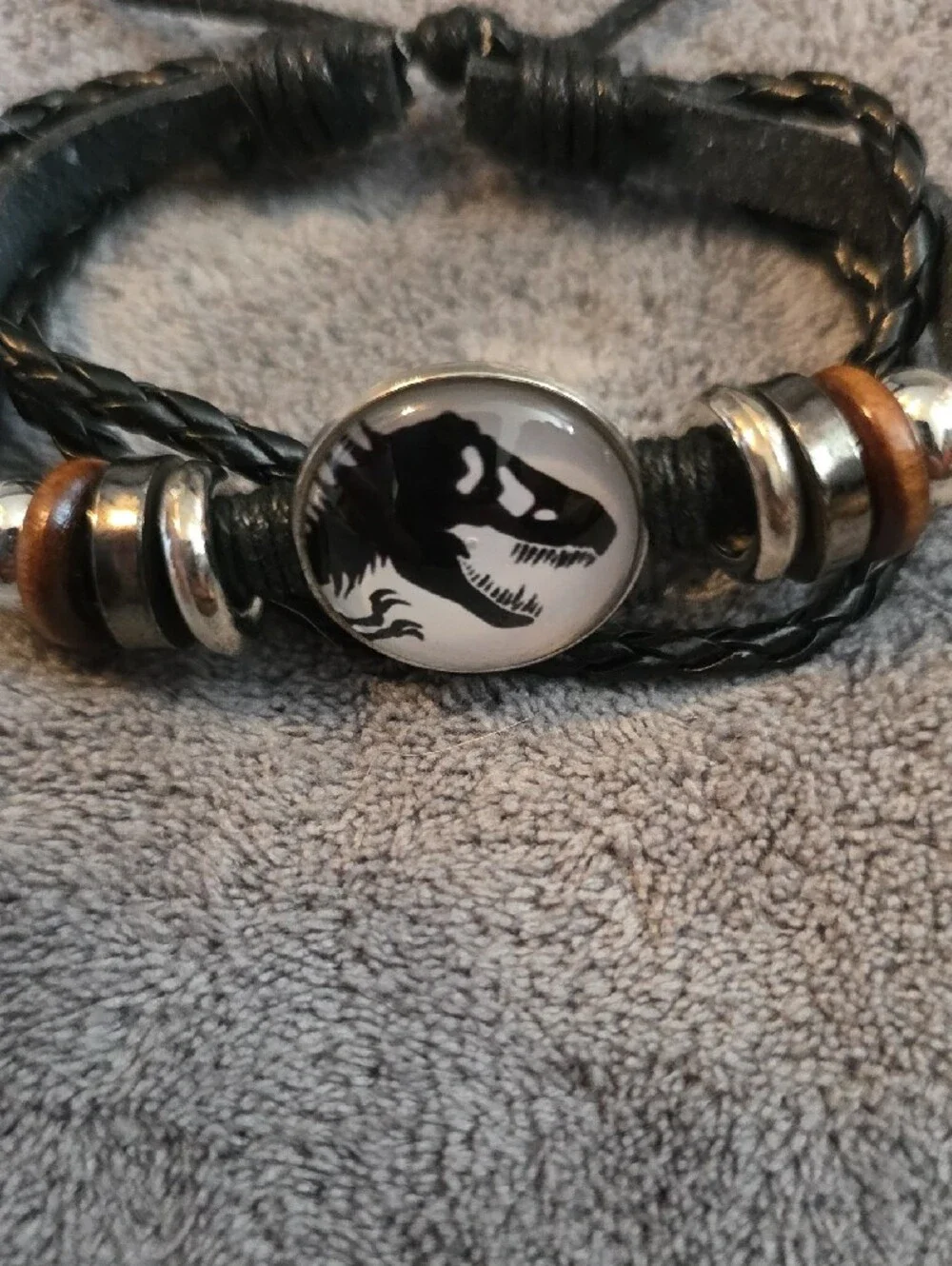 Black Leather Braided Men’s Bracelet with Dino Emblem